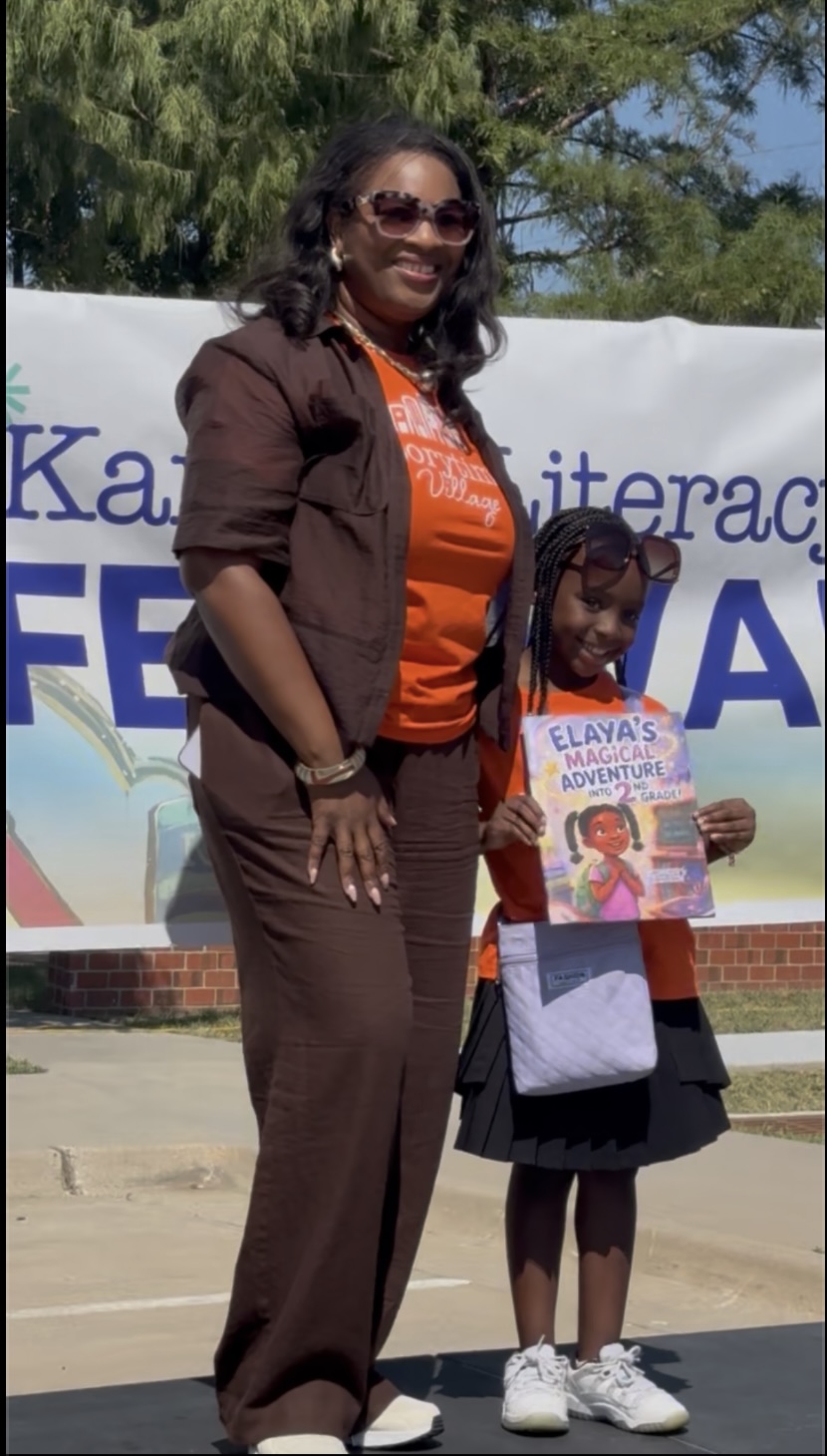 Elaya celebrating her book with her family